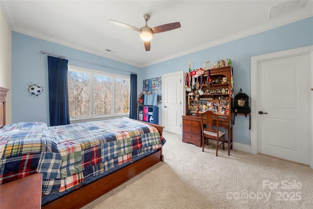 bedroom featuring baseboards, carpet, visible vents, and crown molding