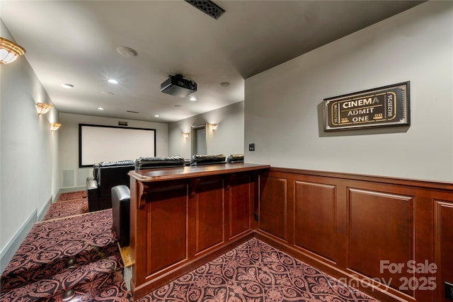 cinema featuring wainscoting, visible vents, and recessed lighting