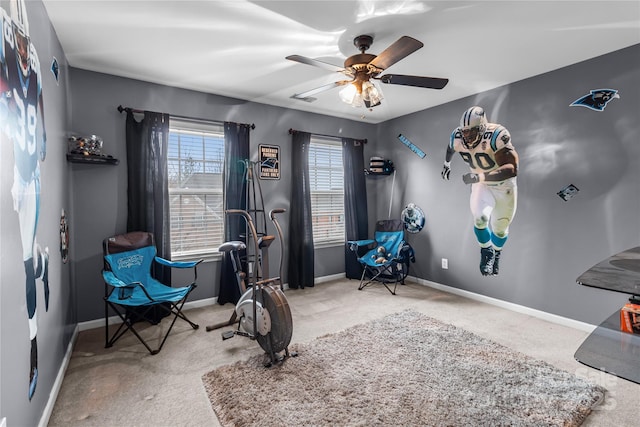 exercise area featuring ceiling fan, carpet flooring, visible vents, and baseboards