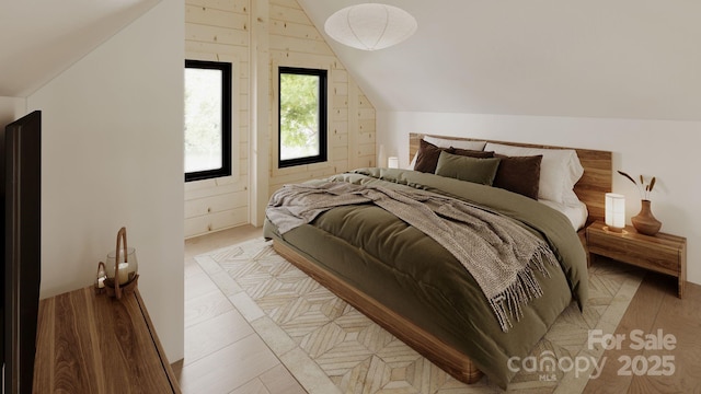 bedroom with lofted ceiling