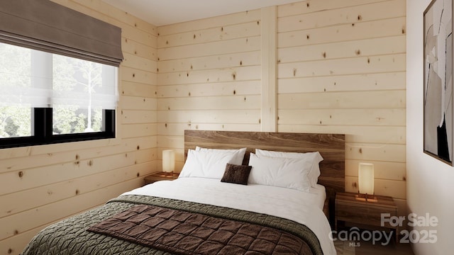 bedroom with wooden walls