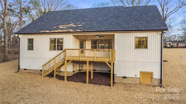 back of property with crawl space, stairway, a deck, a ceiling fan, and roof with shingles