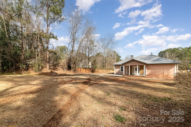 view of yard featuring a porch