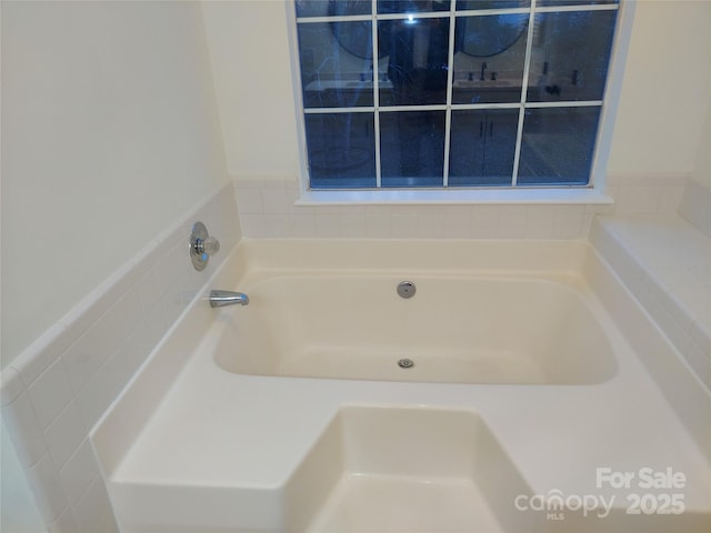 full bath featuring a garden tub