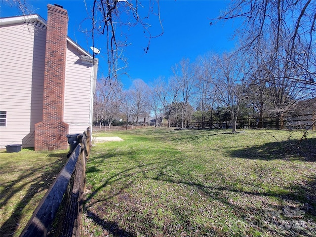 view of yard featuring fence