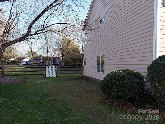 view of yard featuring fence