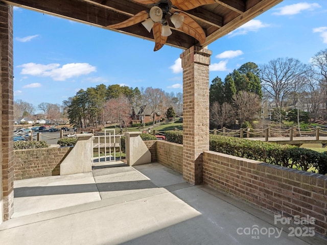 view of patio / terrace featuring a ceiling fan