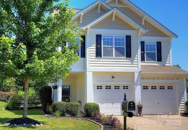 view of front of property featuring driveway and an attached garage