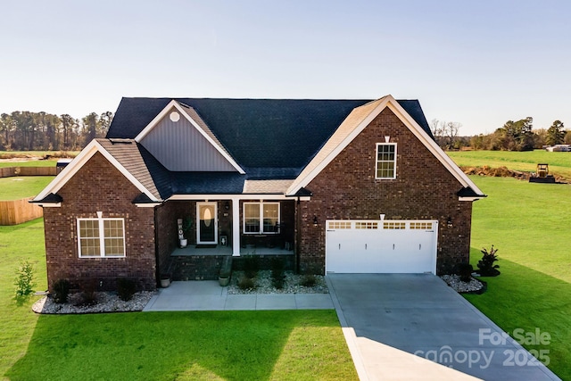 craftsman-style house featuring a front yard and a garage