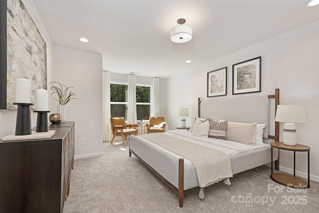 bedroom featuring recessed lighting, baseboards, and light colored carpet