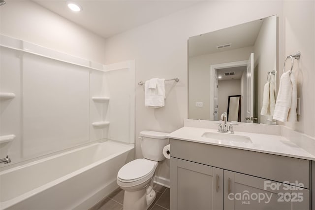 bathroom featuring tile patterned floors, visible vents, toilet, shower / washtub combination, and vanity