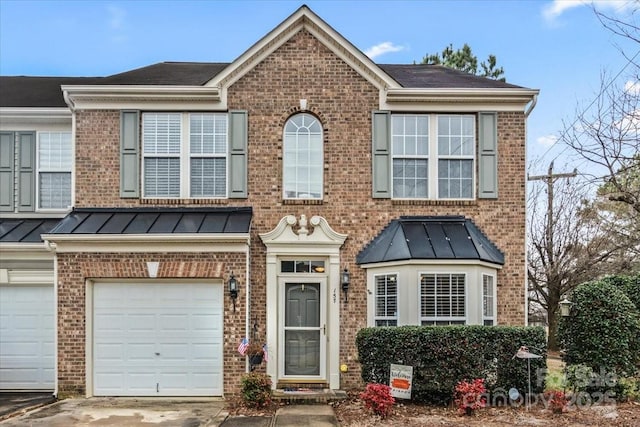 view of front of home with a garage