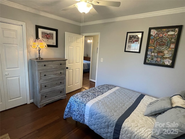 bedroom featuring ceiling fan, dark wood-type flooring, and ornamental molding