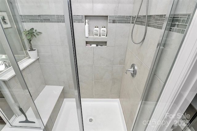 full bathroom with a stall shower