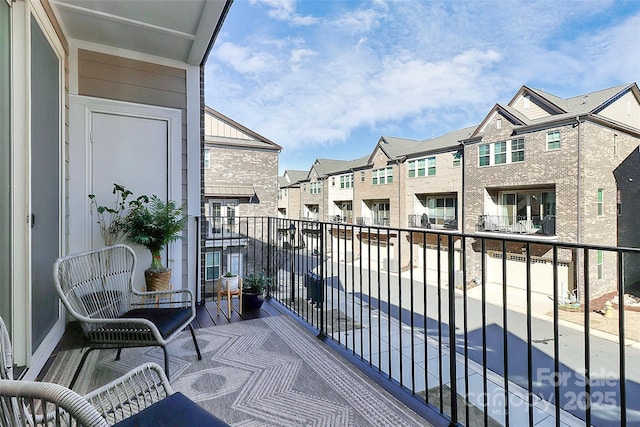 balcony featuring a residential view