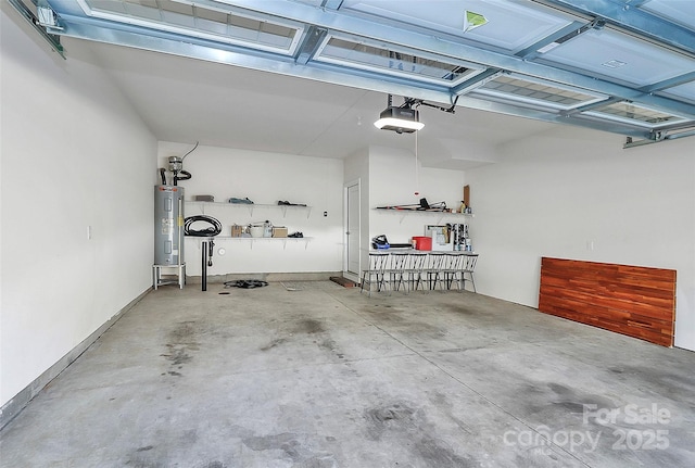 garage featuring a garage door opener and electric water heater