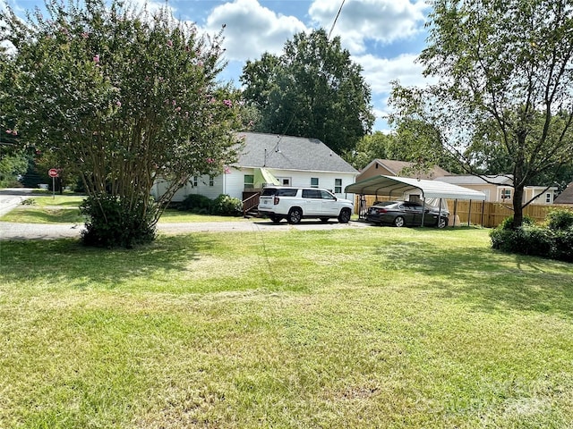 view of yard with a carport