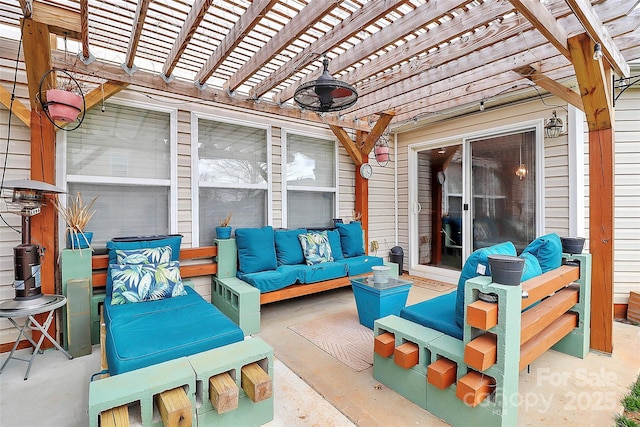 view of patio / terrace with an outdoor living space and a pergola