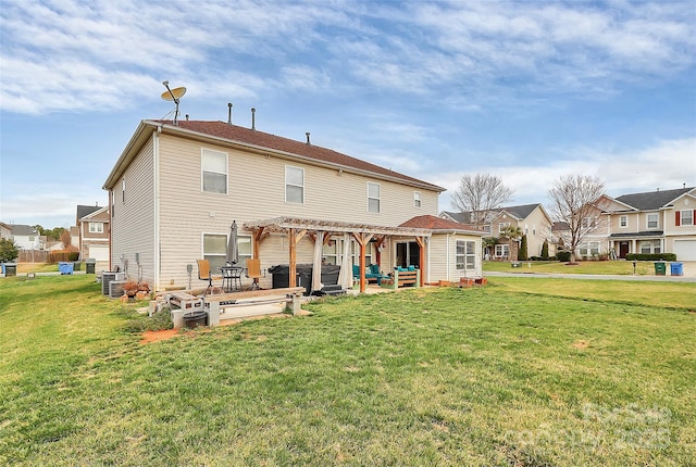 rear view of house with a yard, a patio area, a residential view, and a pergola