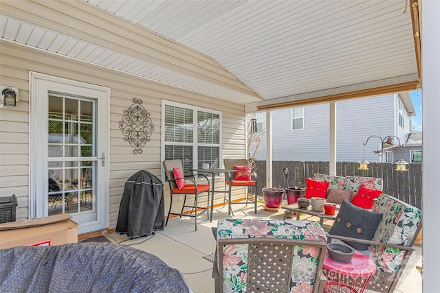 view of patio / terrace featuring fence