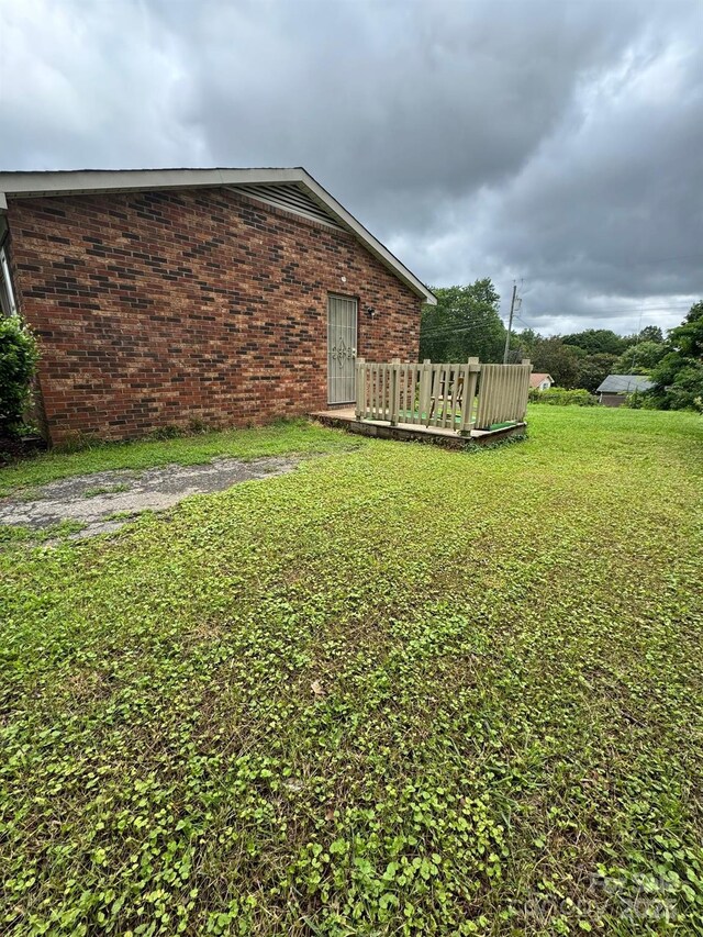 948 Shannon Bradley Rd, Gastonia, NC 28052 - view of green lawn featuring a wooden deck