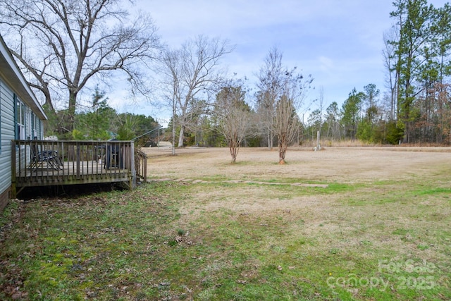 view of yard with a deck