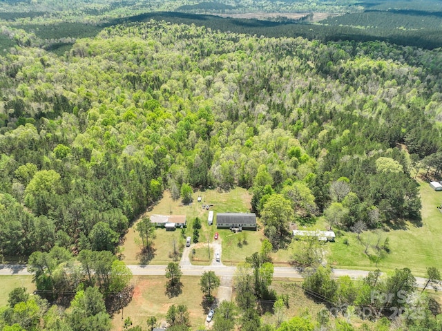 bird's eye view featuring a view of trees
