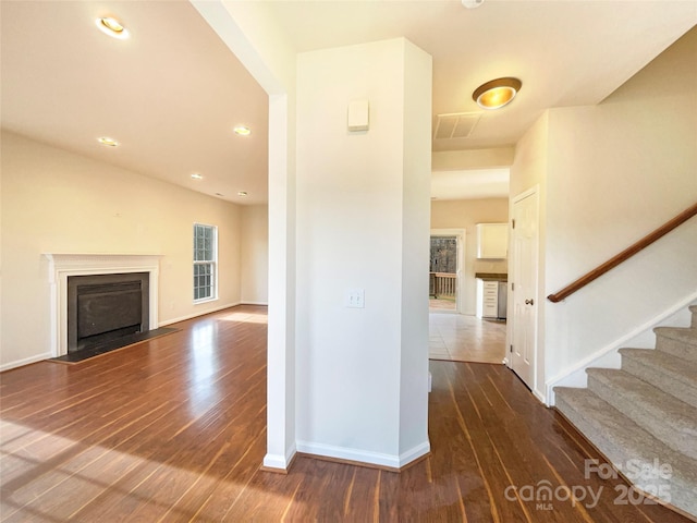 interior space with dark wood-type flooring