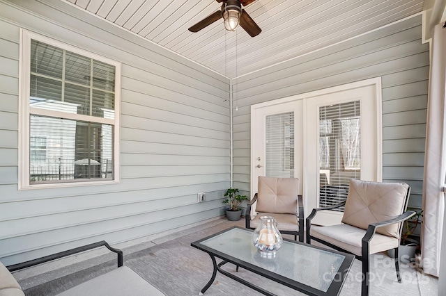 view of patio featuring ceiling fan