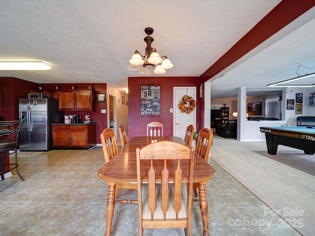 3841 Shasta Cir, Clover, SC 29710 - dining space with a chandelier, billiards table, and a textured ceiling