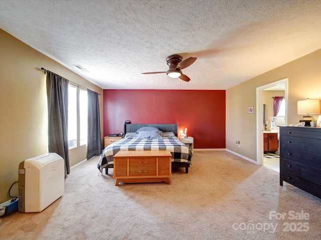 3841 Shasta Cir, Clover, SC 29710 - bedroom with light colored carpet, connected bathroom, ceiling fan, baseboards, and a textured ceiling