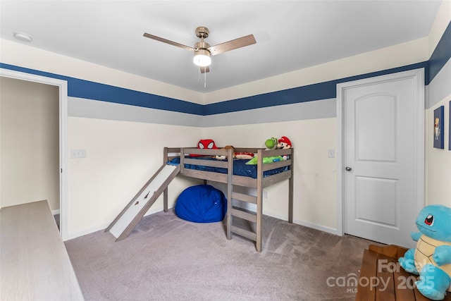 bedroom featuring carpet floors, baseboards, and a ceiling fan