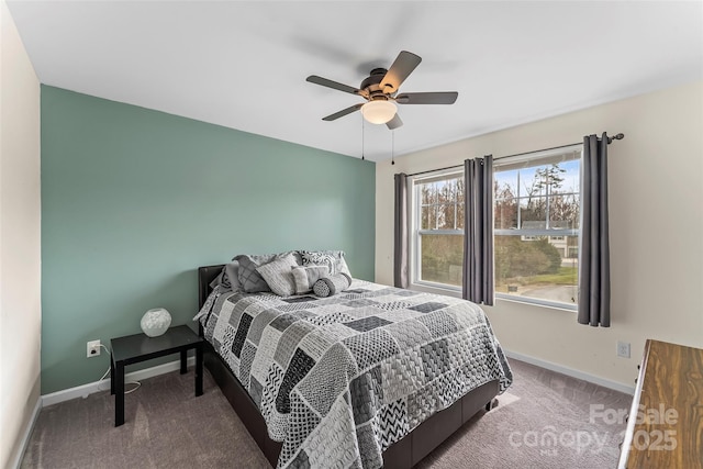 bedroom with carpet, a ceiling fan, and baseboards