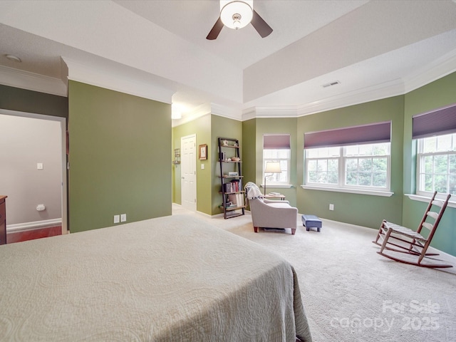 bedroom featuring visible vents, crown molding, light carpet, and baseboards