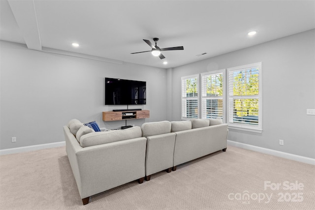 living room featuring recessed lighting, light colored carpet, visible vents, a ceiling fan, and baseboards