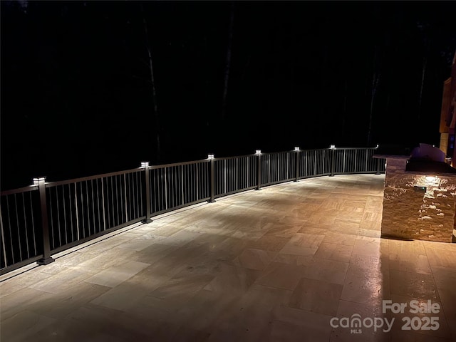 view of patio at night