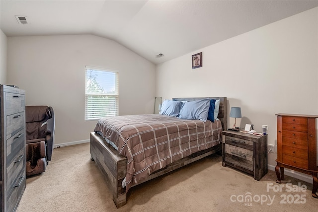 bedroom featuring vaulted ceiling, light carpet, visible vents, and baseboards