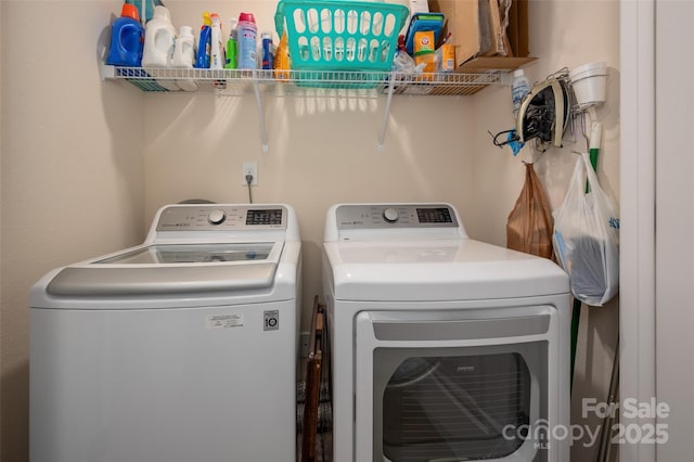 washroom with laundry area and separate washer and dryer