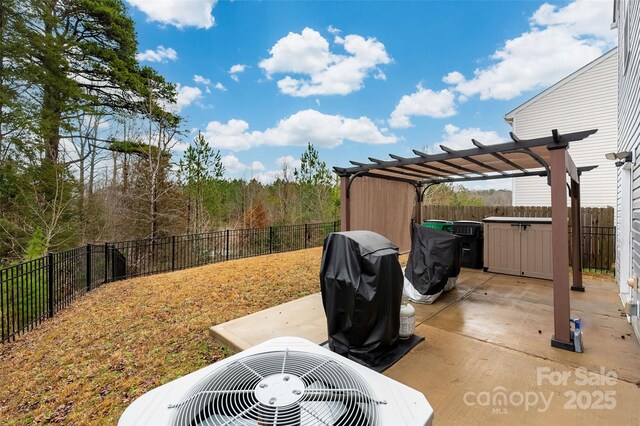 view of patio / terrace featuring a hot tub, a pergola, a fenced backyard, and central air condition unit