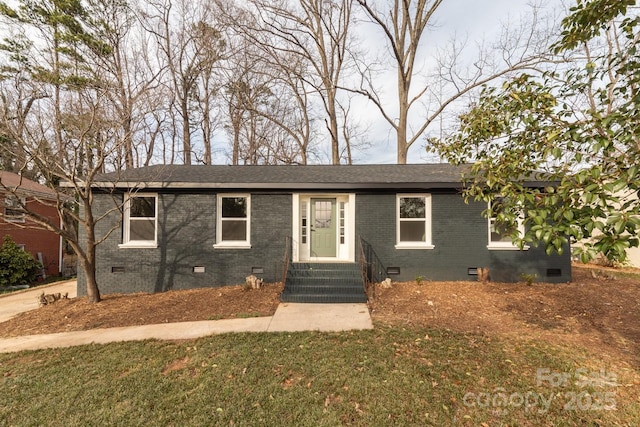 single story home with a shingled roof, entry steps, crawl space, and brick siding