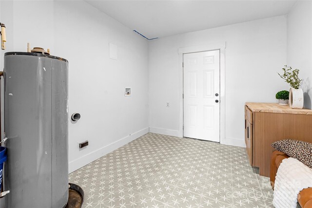5825 Ruth Dr, Charlotte, NC 28215 - washroom with water heater, laundry area, hookup for a washing machine, and baseboards