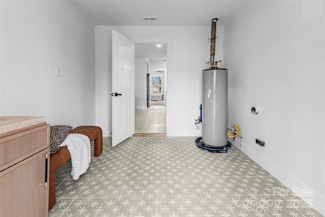 5825 Ruth Dr, Charlotte, NC 28215 - utility room with water heater and visible vents