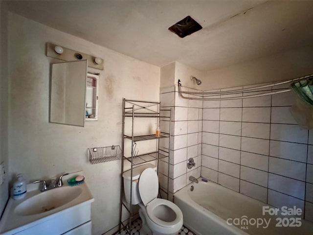 full bath featuring toilet, tub / shower combination, and vanity