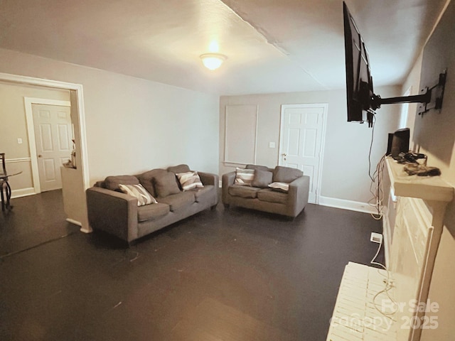 living room featuring baseboards