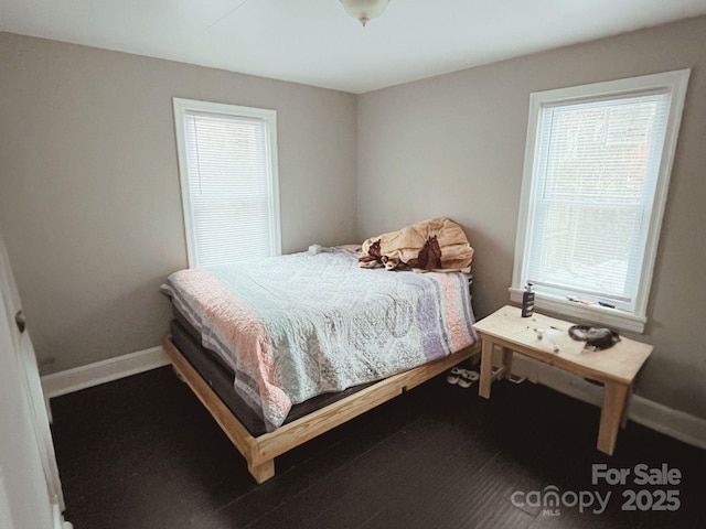 bedroom featuring baseboards