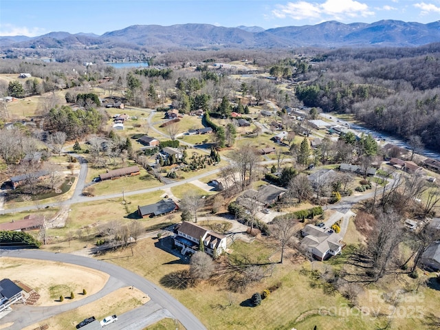 drone / aerial view featuring a mountain view