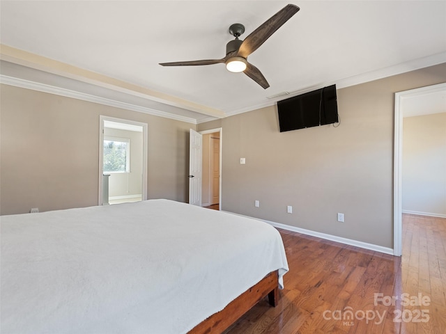 bedroom with ornamental molding, wood finished floors, a ceiling fan, and baseboards