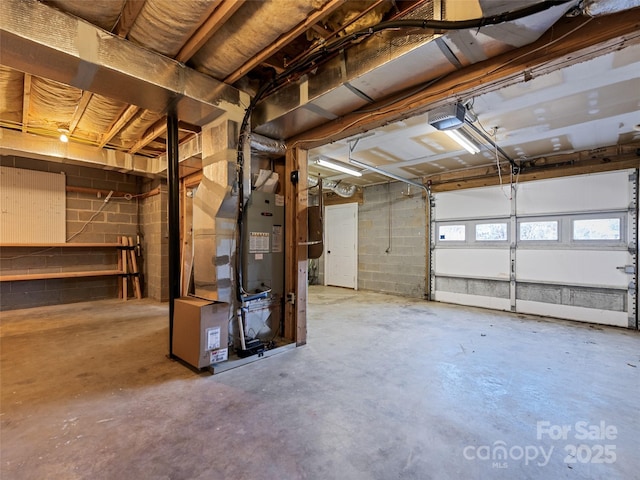 garage with heating unit and a garage door opener