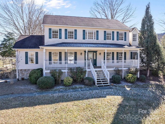 colonial inspired home with covered porch