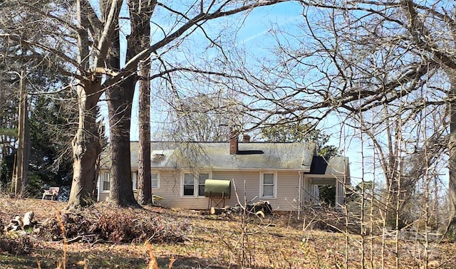 exterior space with a chimney